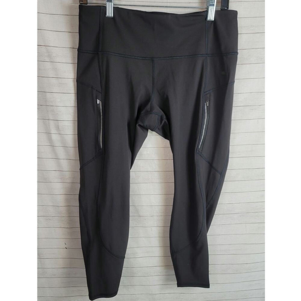 ATHLETA RAINER TIGHT IN BLACK, sz LARGE